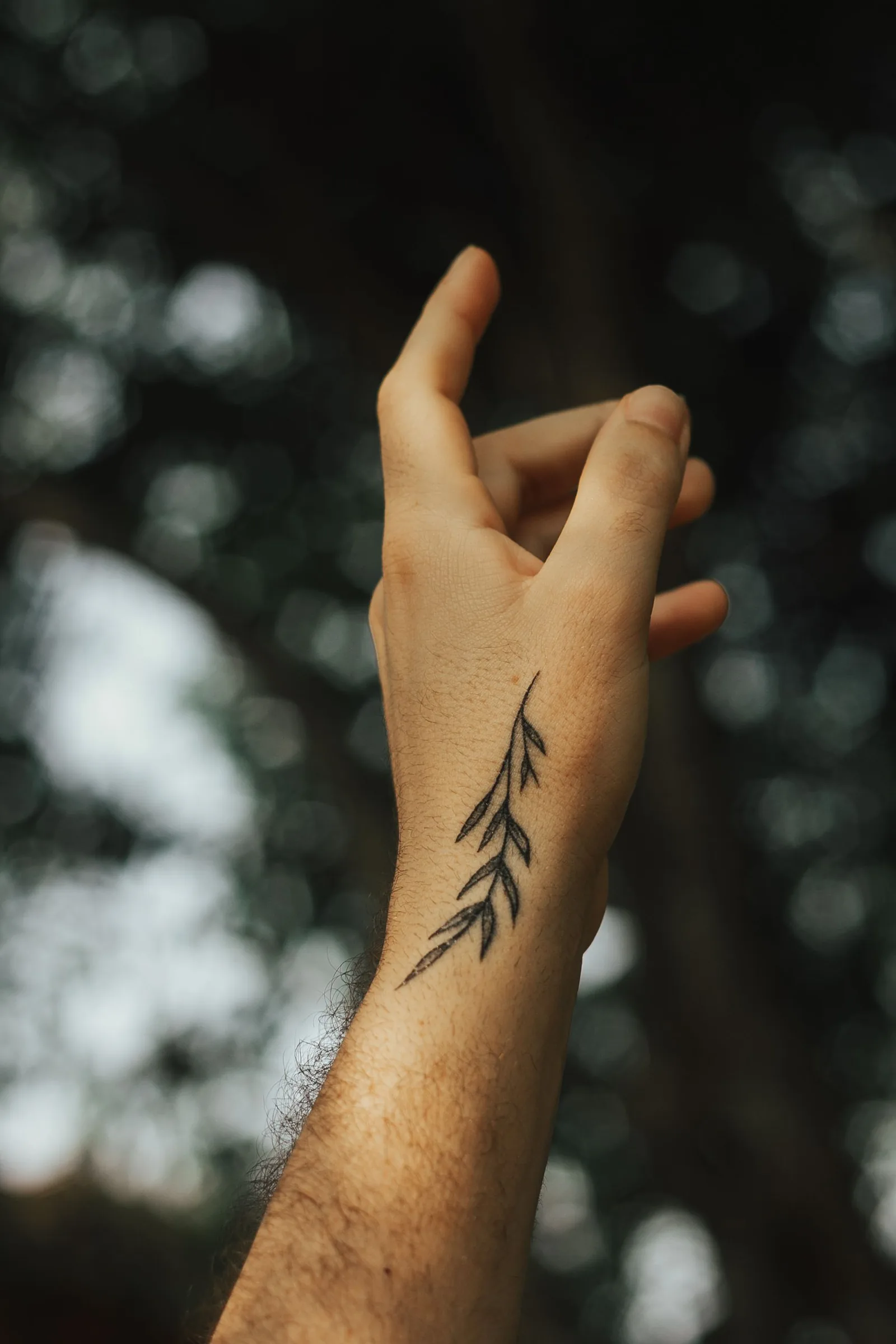 Leaf tattoo on a hand